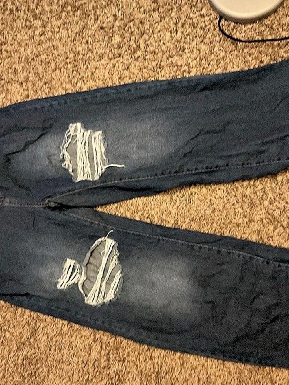 Distressed baggy jeans in dark blue